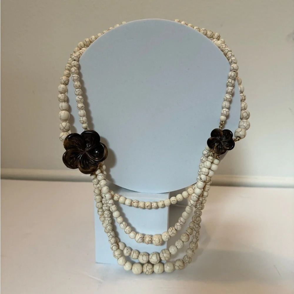 Gorgeous earth tone beaded necklace with brown floral accents